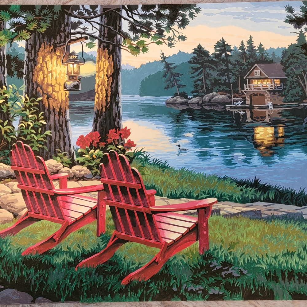 Scenic Lake View Painting with Red Chairs